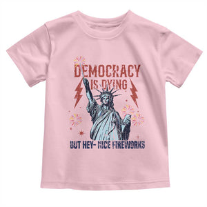 Democracy Is Dying But Hey Nice Fireworks Statue of Liberty Toddler T Shirt Funny 4th Of July Retro TS02 Light Pink Print Your Wear