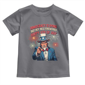 Funny 4th of July Democracy Is Dying Toddler T Shirt But Hey Nice Fireworks Satirical Uncle Sam TS02 Charcoal Print Your Wear