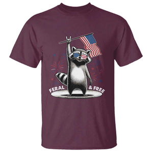 Funny Feral And Free T Shirt 4th of July Patriotic Raccoon With American Flag Fireworks TS11 Maroon Print Your Wear