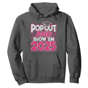 Funny Pop Out And Show Em 2025 Hoodie Pink Senior Class Of 2025 Graduation TS11 Dark Heather Print Your Wear