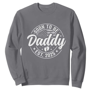 Funny Promoted To Daddy 2025 Sweatshirt Newborn Vintage American Flag Baby Footprint TS11 Charcoal Print Your Wear