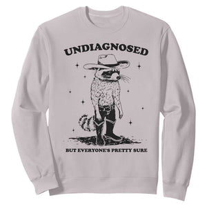 Funny Undiagnosed But Everyone's Pretty Sure Sweatshirt Cowboy Racoon TS11 Ice Gray Print Your Wear