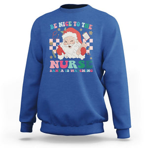 Be Nice To The Nurse Santa is Watching Christmas Sweatshirt TS09 Royal Blue Printyourwear