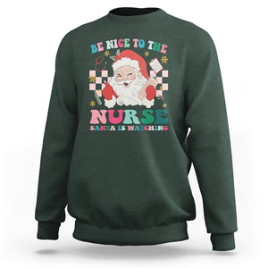 Be Nice To The Nurse Santa is Watching Christmas Sweatshirt TS09 Dark Forest Green Printyourwear