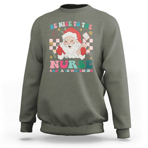 Be Nice To The Nurse Santa is Watching Christmas Sweatshirt TS09 Military Green Printyourwear