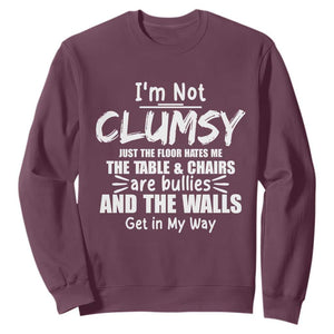 Funny Clumsy People Saying Sweatshirt The Floor Hates Me The Table And Chairs Are Bullies The Walls Get In My Way TS02 Maroon Print Your Wear