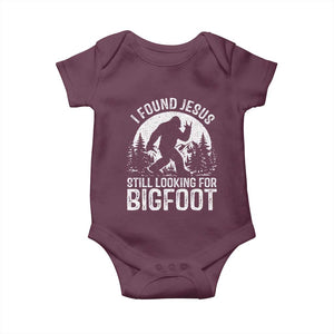 Funny Christian Sasquatch Baby Onesie I Found Jesus Still Looking for Bigfoot Vintage Distressed Graphic TS02 Maroon Print Your Wear