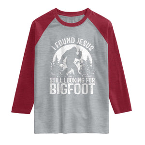 Funny Christian Sasquatch Raglan Shirt I Found Jesus Still Looking for Bigfoot Vintage Distressed Graphic TS02 Heather Gray Heather Red Print Your Wear
