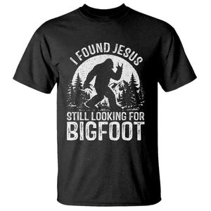 Funny Christian Sasquatch T Shirt I Found Jesus Still Looking for Bigfoot Vintage Distressed Graphic TS02 Black Print Your Wear