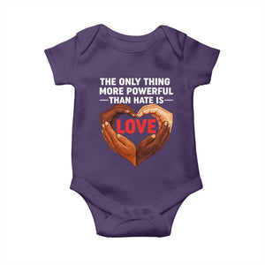 The Only Thing More Powerful Than Hate Is Love Baby Onesie Heart in Hands Unity Bunny Inspirational Quote TS02 Purple Print Your Wear