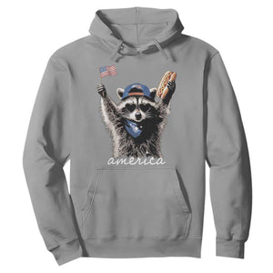 Funny America Raccoon Happy 4th of July Hoodie Holding Hotdog and US Flag Patriotic Graphic