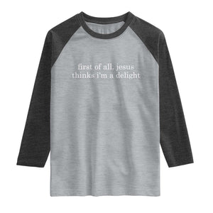 First of All Jesus Thinks Im a Delight Funny Christian Quote Raglan Shirt Minimalist Faith Humor Inspirational Gift TS02 Heather Gray Heather Charcoal Print Your Wear