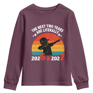 The Next Two Years Are Literally 6 7 Youth Sweatshirt Funny 2026 2027 Meme Dabbing Boy Retro TS02 Maroon Print Your Wear