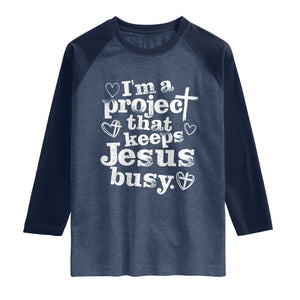 I am a Project That Keeps Jesus Busy Funny Christian Typography Raglan Shirt Faith Humor Inspirational Gift TS02 Heather Denim Navy Print Your Wear