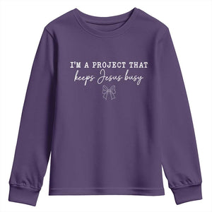 I am a Project That Keeps Jesus Busy Coquette Bow Youth Sweatshirt Christian Faith Humor TS02 Purple Print Your Wear