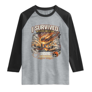 I Survived The Cleveland Meteor 2026 Raglan Shirt Funny Ohio Apocalypse Meme Vintage Football Fan Humor TS02 Heather Gray Black Print Your Wear