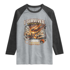 I Survived The Cleveland Meteor 2026 Raglan Shirt Funny Ohio Apocalypse Meme Vintage Football Fan Humor TS02 Heather Gray Heather Charcoal Print Your Wear