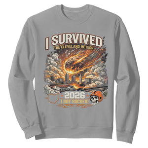 I Survived The Cleveland Meteor 2026 Sweatshirt Funny Ohio Apocalypse Meme Vintage Football Fan Humor TS02 Sport Gray Print Your Wear