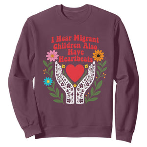 I Hear Migrant Children Also Have Heartbeats Sweatshirt Groovy Retro Floral Hands Heart Social Justice