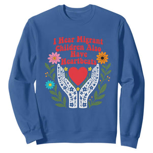 I Hear Migrant Children Also Have Heartbeats Sweatshirt Groovy Retro Floral Hands Heart Social Justice