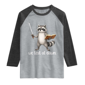 We Test At Dawn Raccoon Warrior Raglan Shirt Funny Student Teacher Exam Motivation TS02 Heather Gray Heather Charcoal Print Your Wear