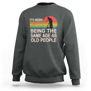 Retro Funny It's Weird Being The Same Age As Old People Sweatshirt TS02 Dark Heather Printyourwear