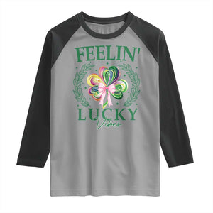 St. Patrick's Day Raglan Shirt Feelin' Lucky Vibes Shamrock Coquette Bow TS09 Sport Gray Black Print Your Wear