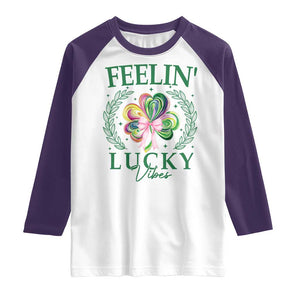 St. Patrick's Day Raglan Shirt Feelin' Lucky Vibes Shamrock Coquette Bow TS09 White Purple Print Your Wear
