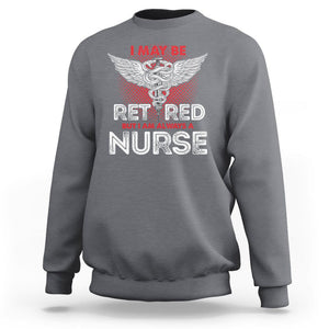Retired Nurse Sweatshirt I May Be Retired But I Am Always A Nurse TS09 Charcoal Printyourwear