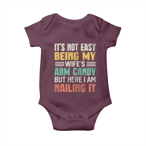 Funny Husband Baby Onesie It's Not Easy Being My Wife's Arm Candy TS09 Maroon Print Your Wear