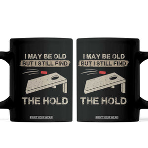 I May Be Old But I Still Find The Hole Cornhole Coffee Mug Funny Old Man Saying TS10 Black Print Your Wear