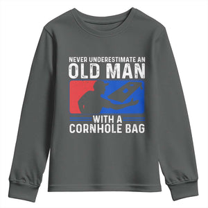 Funny Cornhole Player Youth Sweatshirt Never Underestimate An Old Man With A Cornhole Bag TS10 Dark Heather Print Your Wear