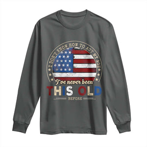 Dont Know How To Act My Age Long Sleeve Shirt Vintage Funny Old Man Saying American Flag TS10 Dark Heather Print Your Wear