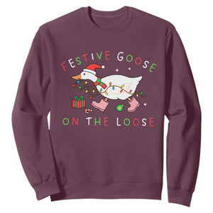 Funny Christmas Goose Sweatshirt Festive Goose On The Loose Xmas Duck Meme TS10 Maroon Print Your Wear