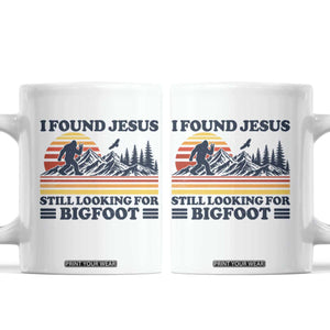Retro I Found Jesus Still Looking For Bigfoot Coffee Mug Funny Sasquatch Bigfoot Believer Christian Humor TS10 White Print Your Wear