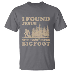 Retro I Found Jesus Still Looking For Bigfoot T Shirt Vintage Sasquatch Believer Funny Christian Humor TS10 Charcoal Print Your Wear
