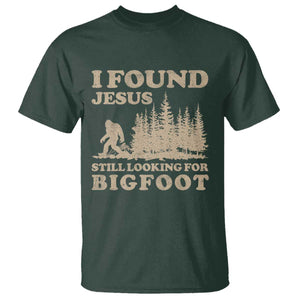 Retro I Found Jesus Still Looking For Bigfoot T Shirt Vintage Sasquatch Believer Funny Christian Humor TS10 Dark Forest Green Print Your Wear