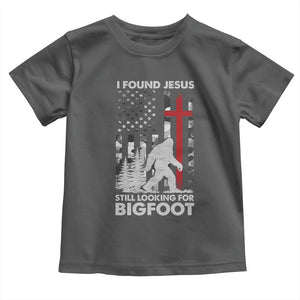 Retro I Found Jesus Still Looking For Bigfoot Toddler T Shirt Camouflage US American Flag Camo TS10 Dark Heather Print Your Wear