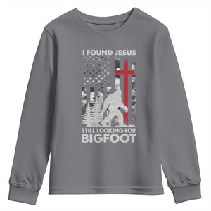 Retro I Found Jesus Still Looking For Bigfoot Youth Sweatshirt Camouflage US American Flag Camo TS10 Charcoal Print Your Wear