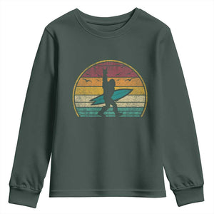 Vintage Bigfoot Surfing Youth Sweatshirt Sasquatch Beach Vacation Retro Surf Sun Shaka TS10 Dark Forest Green Print Your Wear
