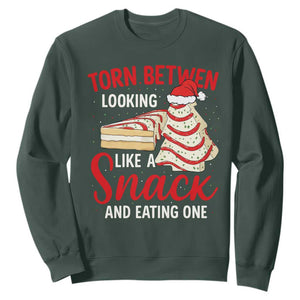 Torn Between Looking Like A Snack Or Eating One Christmas Sweatshirt Debbies Tree Cake TS10 Dark Forest Green Print Your Wear