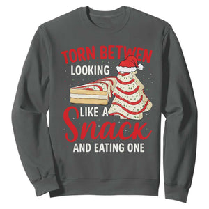Torn Between Looking Like A Snack Or Eating One Christmas Sweatshirt Debbies Tree Cake TS10 Dark Heather Print Your Wear