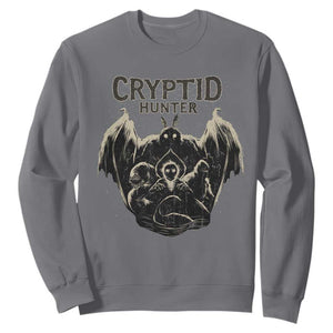 Retro Cryptid Hunter Sweatshirt Mothman Bigfoot Loch Ness Monster Cryptids TS10 Charcoal Print Your Wear