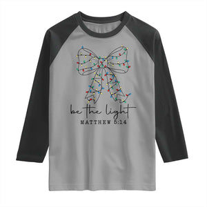 Be The Light Christmas Coquette Bow Raglan Shirt Christian Religious Bible Verse TS10 Sport Gray Black Print Your Wear