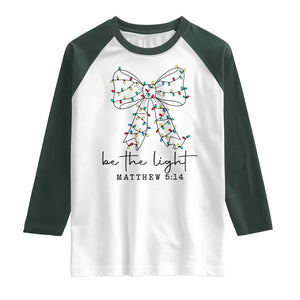 Be The Light Christmas Coquette Bow Raglan Shirt Christian Religious Bible Verse TS10 White Dark Forest Green Print Your Wear