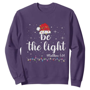 Be The Light Christmas Sweatshirt Christian Religious Bible Verse Santa Hat Pajama TS10 Purple Print Your Wear