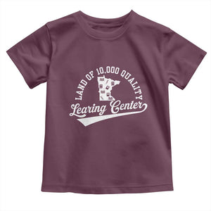 Funny Land Of 10000 Learing Center 2025 Toddler T Shirt Anti Scam Awareness School Quote TS11 Maroon Print Your Wear