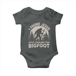 I Found Jesus Still Looking For Bigfoot Baby Onesie Funny Christian Sasquatch Forest TS11 Dark Heather Print Your Wear