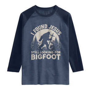 I Found Jesus Still Looking For Bigfoot Raglan Shirt Funny Christian Sasquatch Forest TS11 Heather Denim Navy Print Your Wear