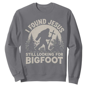 I Found Jesus Still Looking For Bigfoot Sweatshirt Funny Christian Sasquatch Forest TS11 Charcoal Print Your Wear